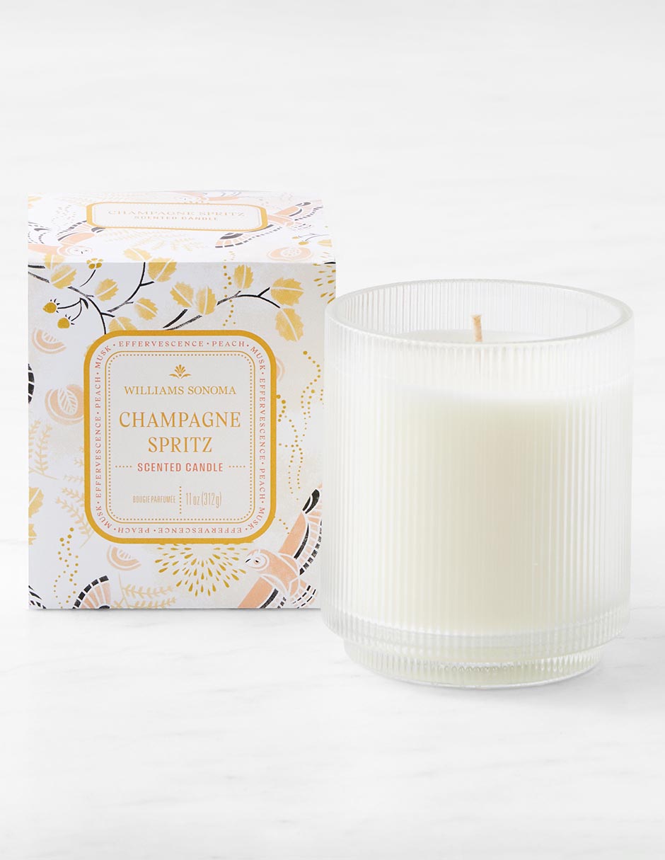 Vela aromática Home Scents Champagne Spritz aroma melocotón maduro y almizcle terroso